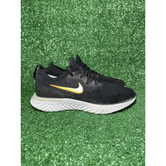 Nike Womens Epic React Flyknit Black Gold Athletic Sneaker Running Shoe Size 8.5 - Picture 1 of 9